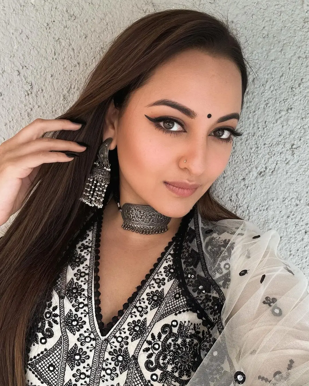 Mumbai Actress Sonakshi Sinha Long Hair Photoshoot in Black Dress